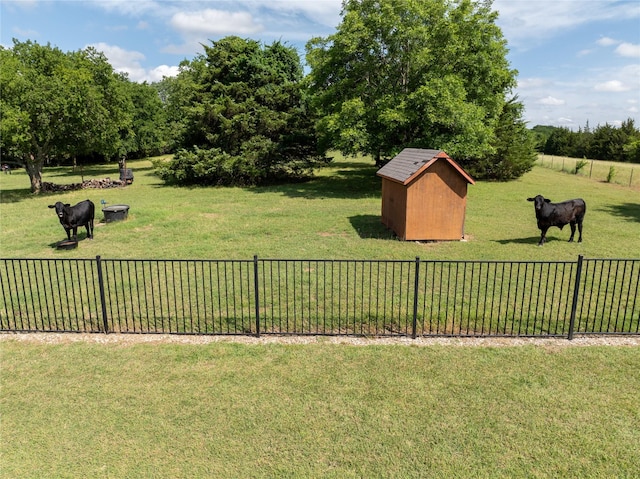 4933 County Road 340, Mckinney, TX 75071 - view of yard featuring an outbuilding, fence, a rural view, and a shed