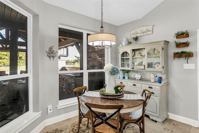 4933 County Road 340, Mckinney, TX 75071 - dining space with an inviting chandelier, light tile patterned floors, and baseboards