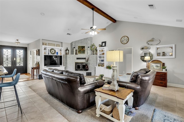 4933 County Road 340, Mckinney, TX 75071 - living room with a ceiling fan, light tile patterned flooring, beam ceiling, and visible vents