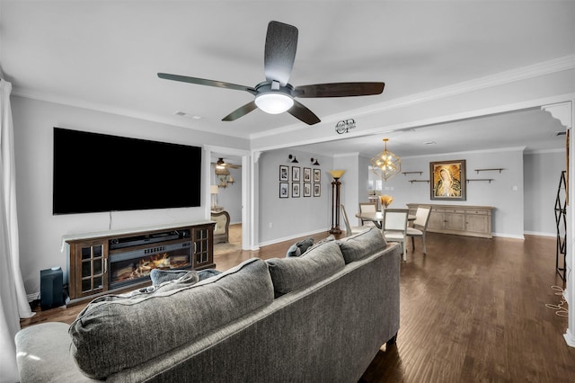 1607 Brandon St, Dallas, TX 75208 - living area featuring a ceiling fan, a glass covered fireplace, wood finished floors, and ornamental molding