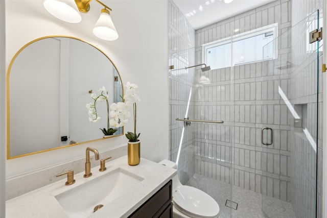 4415 Merrell Rd, Dallas, TX 75229 - bathroom featuring a shower stall, toilet, and vanity
