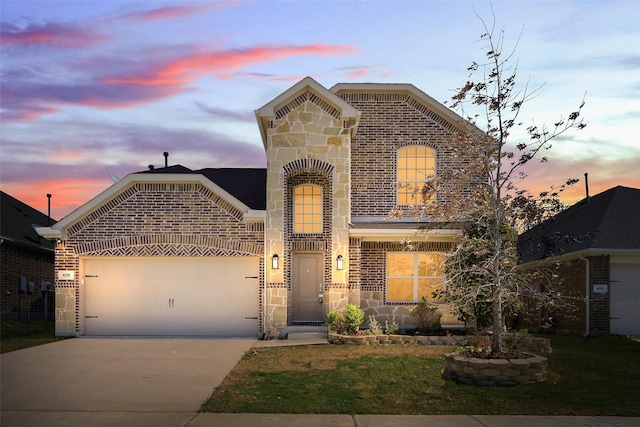 405 Waterton Dr, Anna, TX 75409 - view of front of property featuring concrete driveway, a garage, brick siding, and stone siding