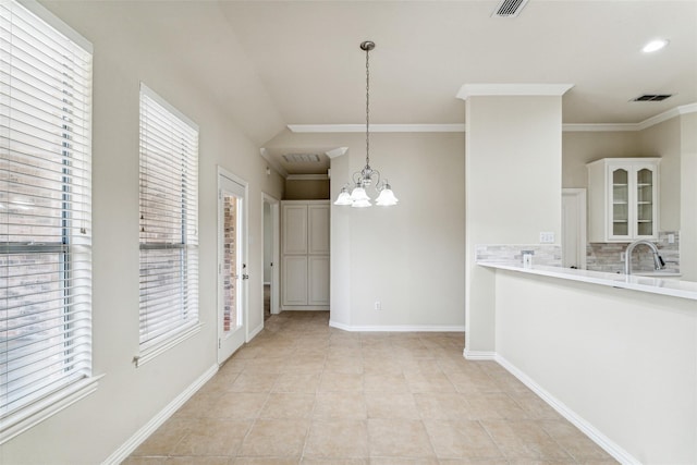 3104 Rim Rock Ct, Granbury, TX 76049 - unfurnished dining area featuring visible vents, a notable chandelier, ornamental molding, light tile patterned flooring, and baseboards