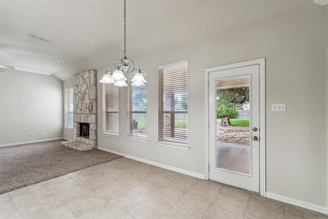 3104 Rim Rock Ct, Granbury, TX 76049 - interior space with visible vents, light carpet, a stone fireplace, lofted ceiling, and a chandelier
