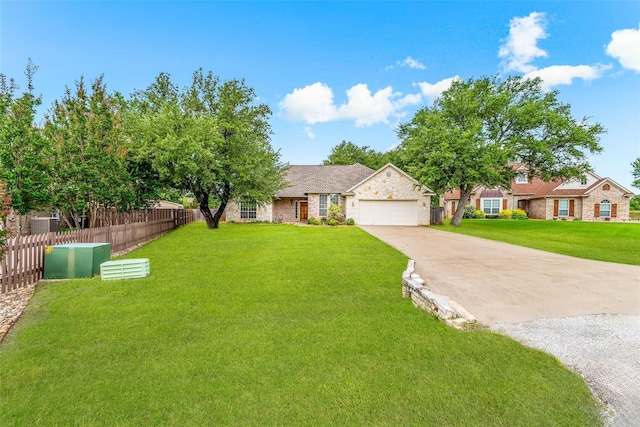3104 Rim Rock Ct, Granbury, TX 76049 - view of front facade with a front lawn, driveway, stone siding, fence, and an attached garage