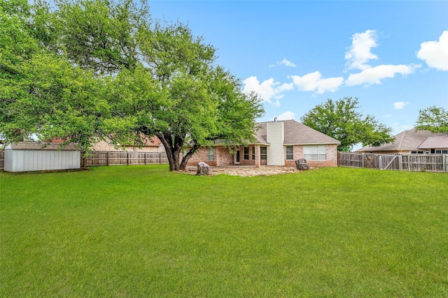 3104 Rim Rock Ct, Granbury, TX 76049 - view of yard with a storage unit, an outdoor structure, and a fenced backyard
