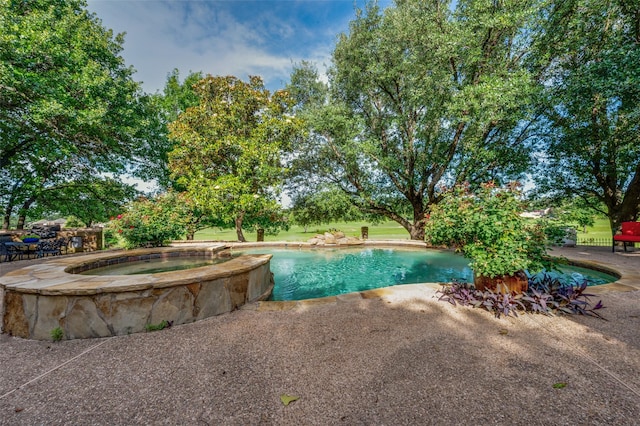 1630 Oak Ridge Dr, Corinth, TX 76210 - view of pool with a patio area and a pool with connected hot tub