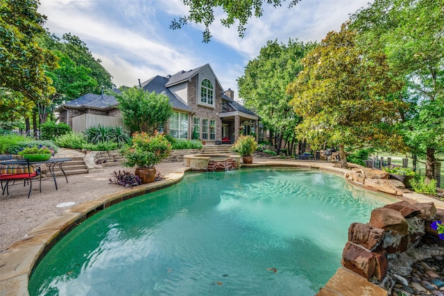 1630 Oak Ridge Dr, Corinth, TX 76210 - view of swimming pool featuring a patio and a pool with connected hot tub