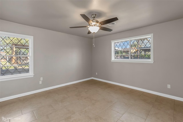 3819 Eileen Ln, Shreveport, LA 71109 - spare room featuring healthy amount of natural light, baseboards, and a ceiling fan
