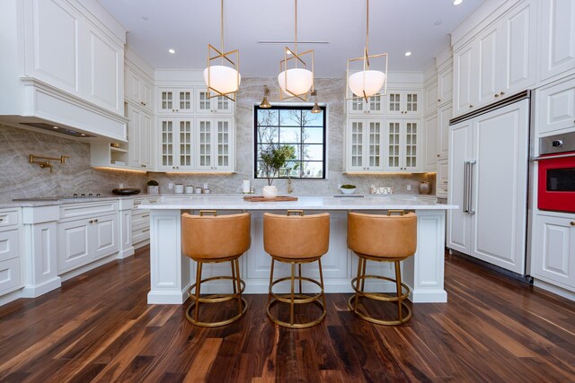 1230 Oak View Ct, Oak Point, TX 75068 - kitchen with paneled built in refrigerator, oven, light countertops, white cabinetry, and recessed lighting