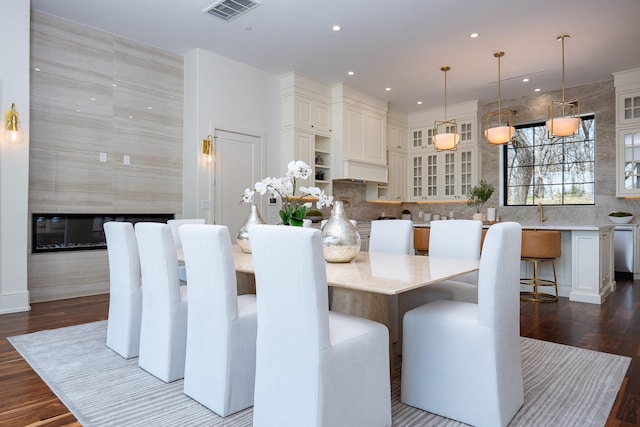 1230 Oak View Ct, Oak Point, TX 75068 - dining room with dark wood finished floors and recessed lighting