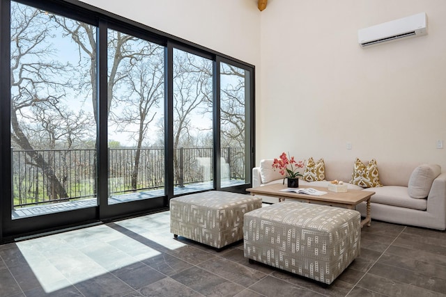 1230 Oak View Ct, Oak Point, TX 75068 - sitting room with a wall mounted AC, plenty of natural light, and dark tile patterned flooring