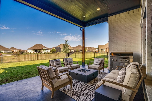 view of patio featuring an outdoor living space with a fire pit, a grill, a fenced backyard, and a residential view