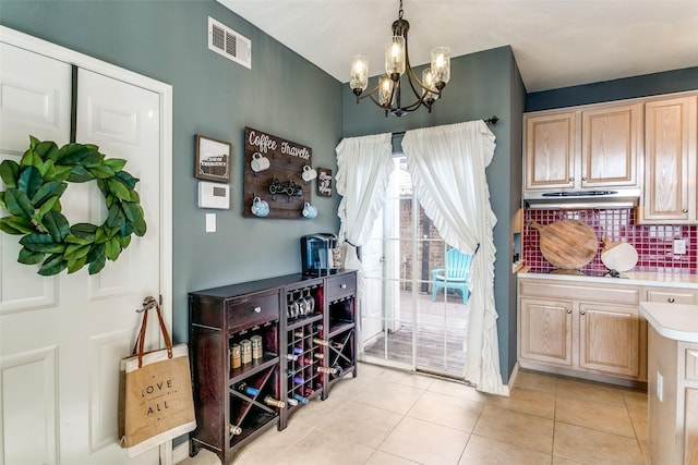 227 Moss Hill Rd, Irving, TX 75063 - dining room featuring a chandelier and light tile patterned floors