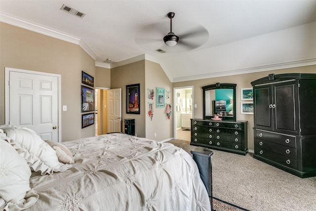 227 Moss Hill Rd, Irving, TX 75063 - carpeted bedroom with baseboards, ornamental molding, vaulted ceiling, ensuite bath, and ceiling fan