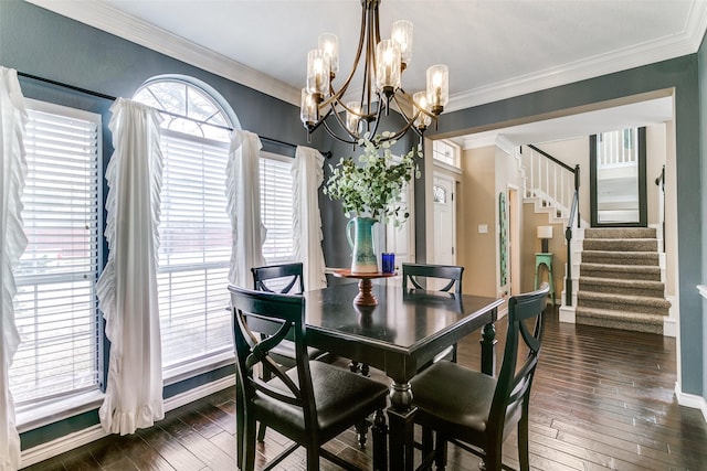 227 Moss Hill Rd, Irving, TX 75063 - dining space with a chandelier, dark wood finished floors, stairway, baseboards, and crown molding