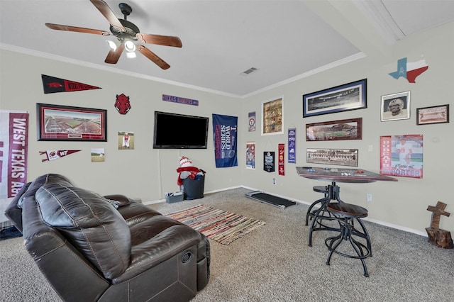 living area with carpet flooring, baseboards, ceiling fan, and ornamental molding