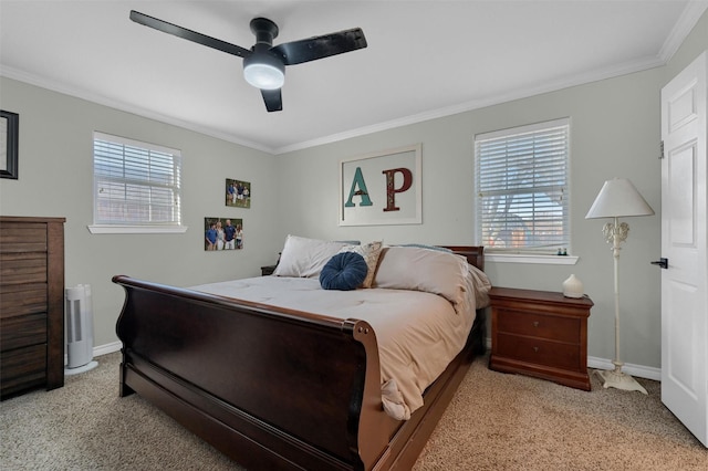 bedroom featuring ceiling fan, baseboards, light colored carpet, and ornamental molding