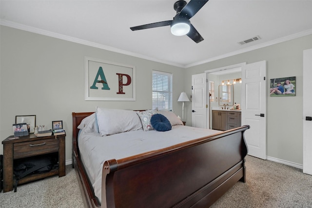 bedroom featuring visible vents, baseboards, light colored carpet, and ornamental molding