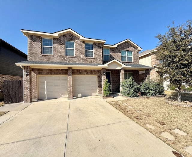 7413 Lake Vista Way, Fort Worth, TX 76179 - view of front facade with brick siding, a garage, and driveway