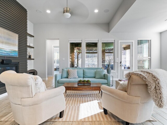 883 Alfred Ct, Allen, TX 75013 - living area featuring plenty of natural light, a ceiling fan, recessed lighting, baseboards, and a large fireplace