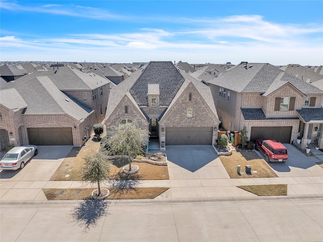 846 Underwood Ln, Celina, TX 75009 - french provincial home featuring driveway, a residential view, brick siding, stone siding, and a shingled roof