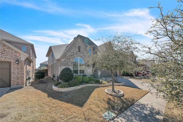 846 Underwood Ln, Celina, TX 75009 - view of front of property with brick siding and a front lawn