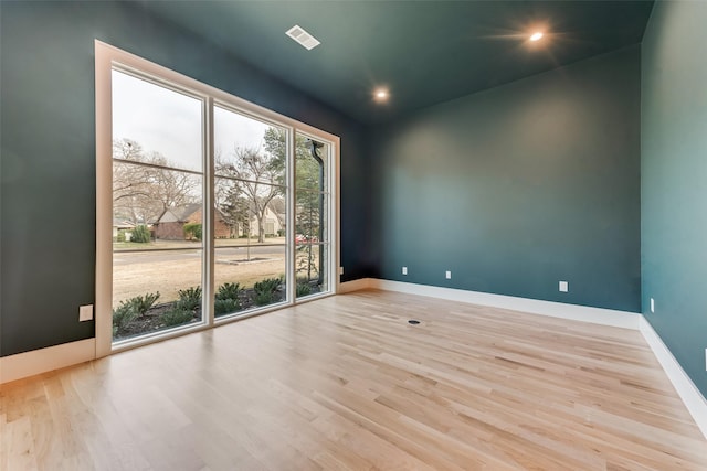 10519 Somerton Dr, Dallas, TX 75229 - empty room with recessed lighting, baseboards, visible vents, and wood finished floors
