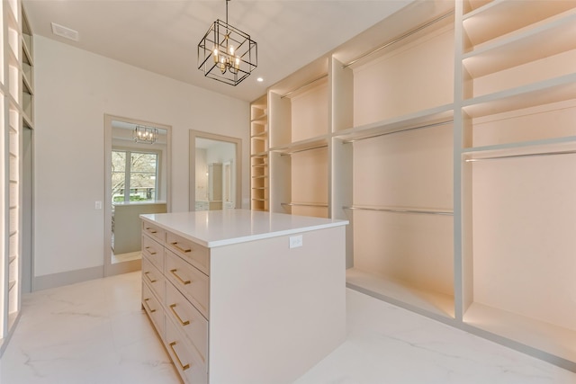 10519 Somerton Dr, Dallas, TX 75229 - spacious closet with visible vents, an inviting chandelier, and marble finish floor