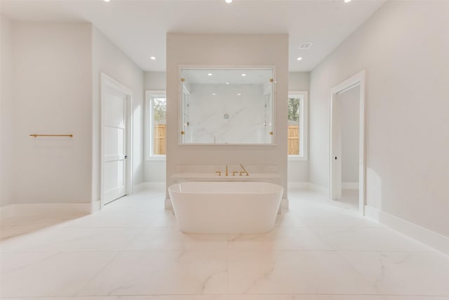 10519 Somerton Dr, Dallas, TX 75229 - full bath with a freestanding tub, a marble finish shower, baseboards, and recessed lighting