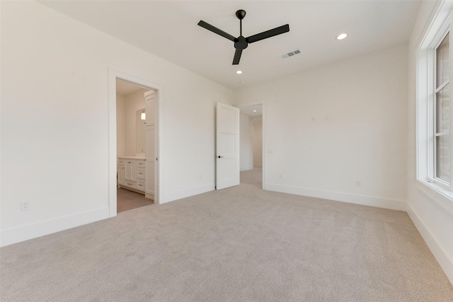 10519 Somerton Dr, Dallas, TX 75229 - unfurnished bedroom with visible vents, recessed lighting, baseboards, and light carpet