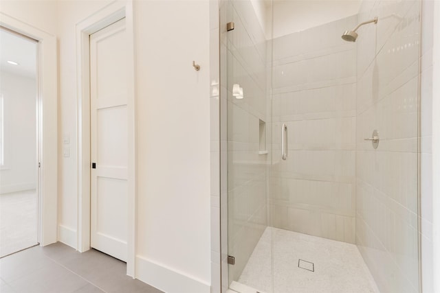 10519 Somerton Dr, Dallas, TX 75229 - bathroom featuring tile patterned flooring and a shower stall
