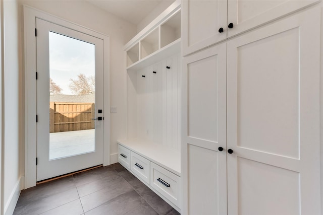 10519 Somerton Dr, Dallas, TX 75229 - mudroom with dark tile patterned flooring
