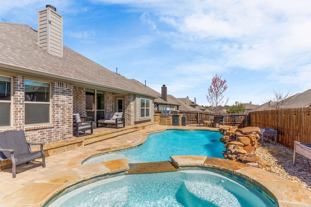 1229 Bridgeport Dr, Anna, TX 75409 - view of pool with a patio, a pool with connected hot tub, and exterior kitchen