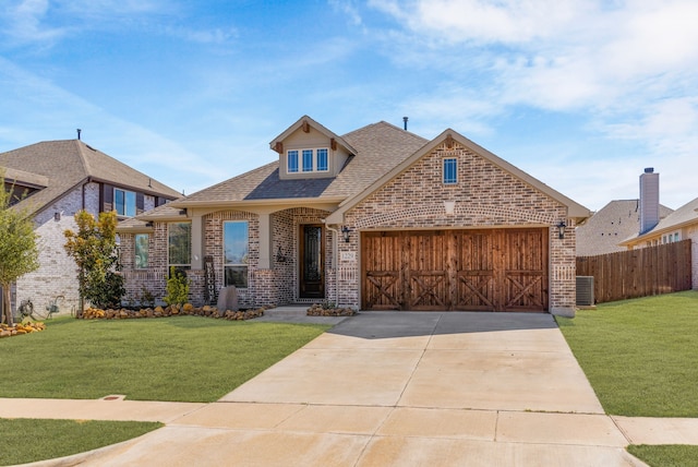 1229 Bridgeport Dr, Anna, TX 75409 - view of front of home featuring brick siding, cooling unit, a garage, driveway, and a shingled roof