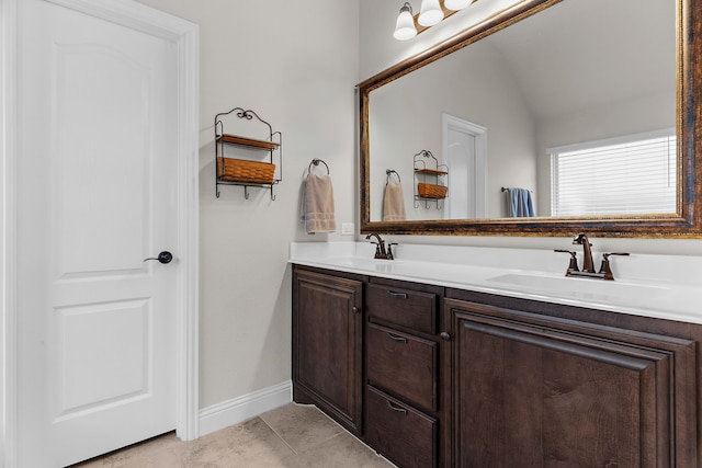 1229 Bridgeport Dr, Anna, TX 75409 - full bath with double vanity, tile patterned floors, and baseboards