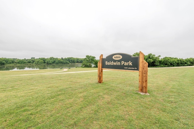 1229 Bridgeport Dr, Anna, TX 75409 - community sign featuring a water view and a yard