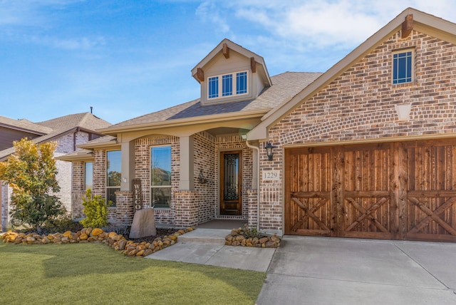 1229 Bridgeport Dr, Anna, TX 75409 - view of front of home featuring brick siding, a front lawn, a shingled roof, driveway, and a garage
