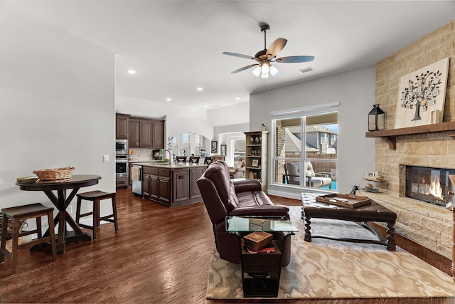 1229 Bridgeport Dr, Anna, TX 75409 - living room featuring ceiling fan, dark wood finished floors, a fireplace, and recessed lighting
