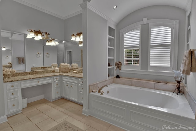 bathroom with tile patterned flooring, built in shelves, lofted ceiling, a bath, and vanity