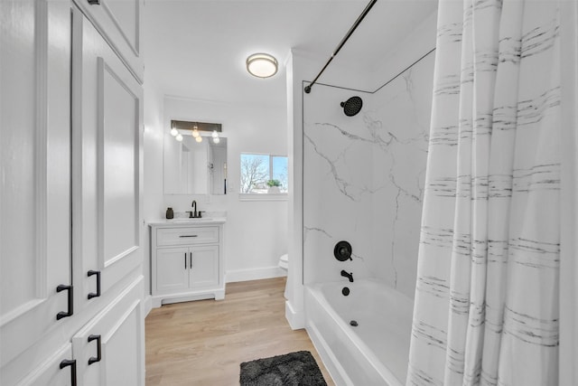 full bathroom featuring vanity, shower / tub combo, toilet, and wood finished floors