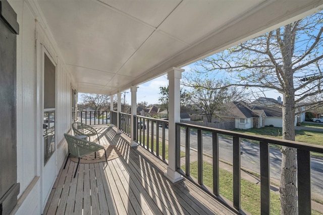 balcony featuring a residential view