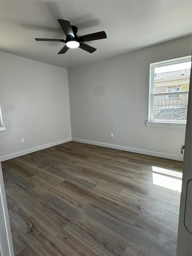 4034 Odessa St, Dallas, TX 75212 - unfurnished room featuring a ceiling fan, baseboards, and dark wood finished floors