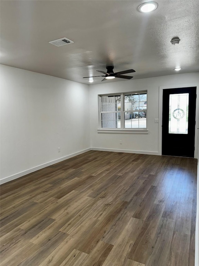 4034 Odessa St, Dallas, TX 75212 - foyer entrance featuring dark wood-style flooring, a ceiling fan, and baseboards