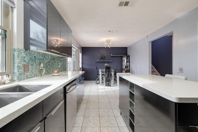 kitchen featuring open shelves, stainless steel dishwasher, backsplash, marble finish floor, and visible vents