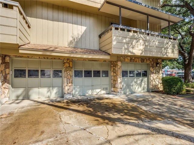 garage featuring driveway
