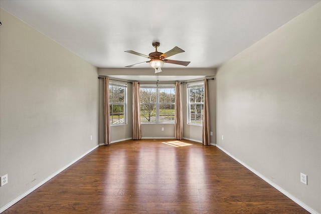 182 Kim St, Mount Vernon, TX 75457 - unfurnished room with baseboards, ceiling fan, and wood finished floors
