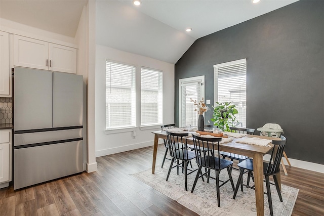 2320 Stella Ln, Northlake, TX 76247 - dining area featuring vaulted ceiling, plenty of natural light, baseboards, wood finished floors, and recessed lighting