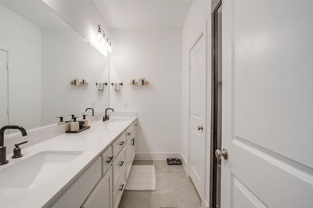 2320 Stella Ln, Northlake, TX 76247 - full bathroom with tile patterned flooring, double vanity, and baseboards