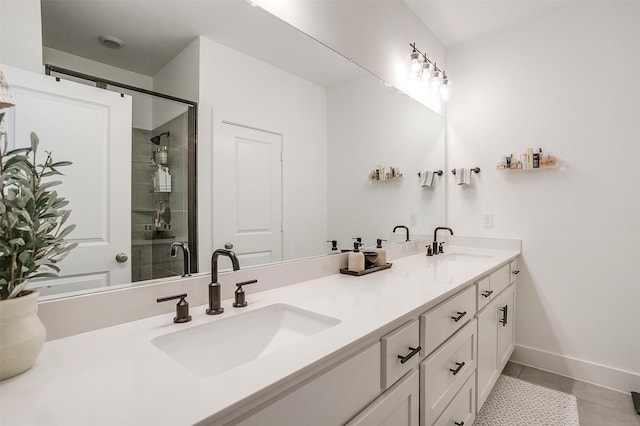 2320 Stella Ln, Northlake, TX 76247 - bathroom with a stall shower, tile patterned floors, double vanity, and baseboards